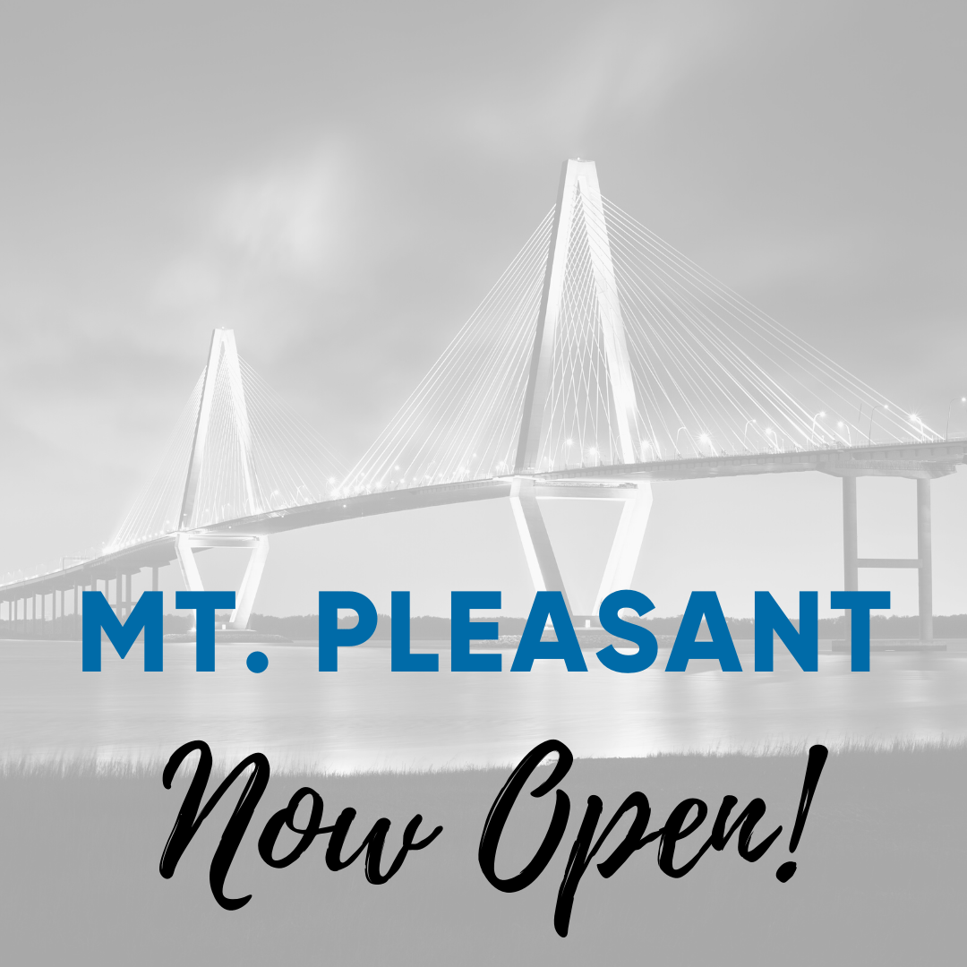 A black and white photo of the bridge with text that says " mt. Pleasant now open ".