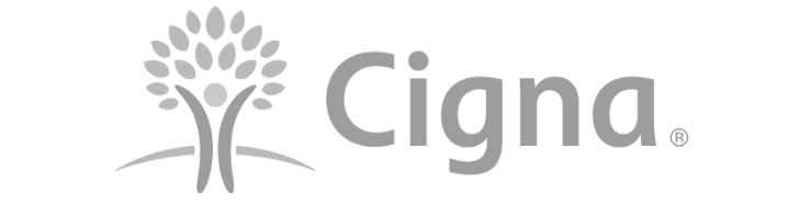 A green background with the word cigna in grey letters.